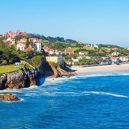 Junto A La Playa De Comillas Апартаменты *